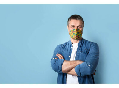 Portrait of handsome mature man on color background